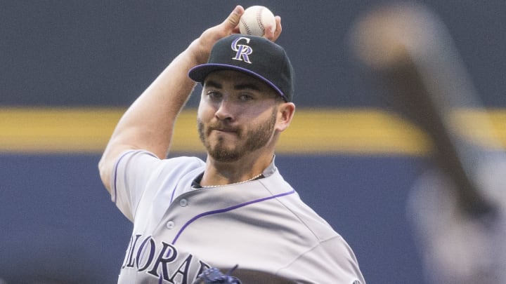 Carter homers, Nelson gets rare win as Brewers beat Rockies