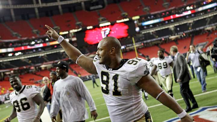 Slaying of former Saints player resonates in city he loved