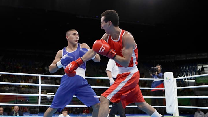 Fighting for Honduras, US-born teen loses to French boxer