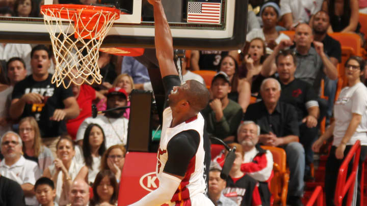 Wade gets 30, Heat pull away from Nets 110-99
