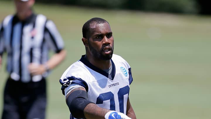Cowboys back McFadden breaks elbow, likely out to start camp