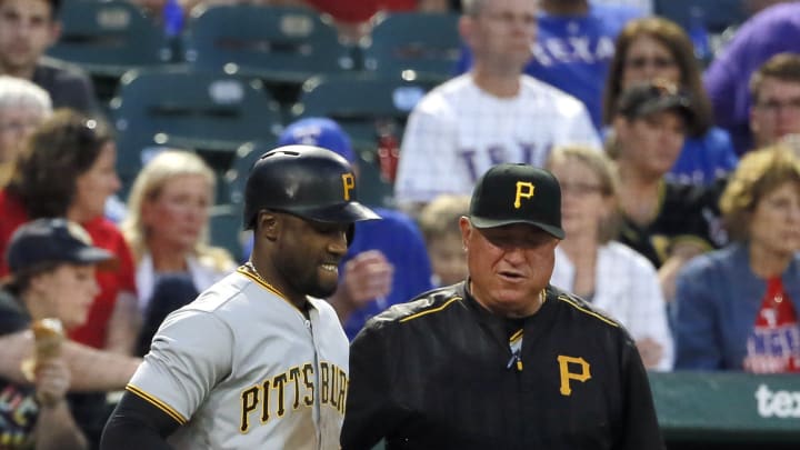 Hamels' 12-game win streak ends as Pirates top Rangers 9-1