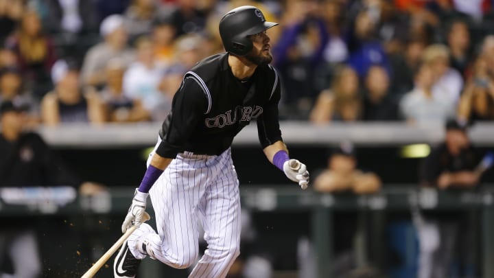 Rockies rookie Dahl's 17-game hit streak matches MLB record