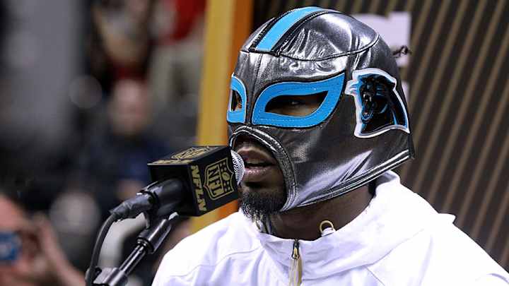 Panthers players wear luchador masks at Super Bowl Media Day