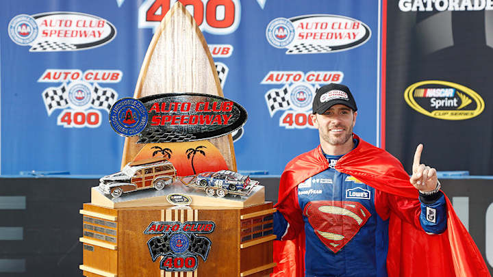 Jimmie Johnson gets past Harvick in overtime to win at Fontana