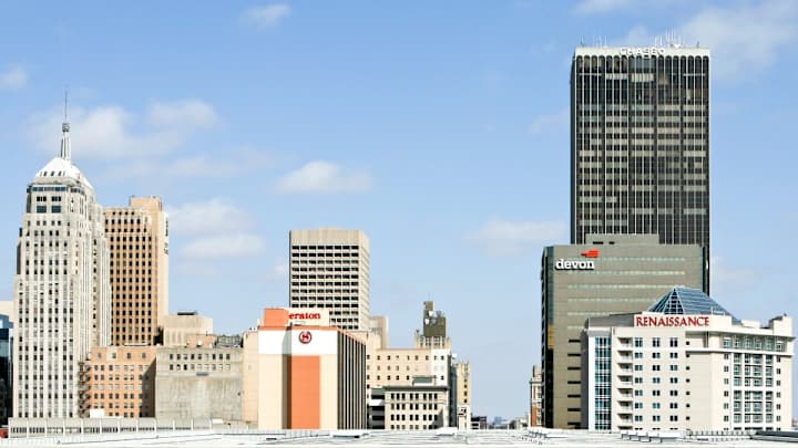 Watch trick shot team Dude Perfect make a basket from a skyscraper