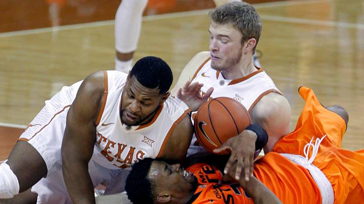 Texas holds on to beat Oklahoma State 74-69