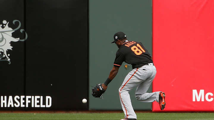 Peavy throws better in Giants'  loss to Rangers