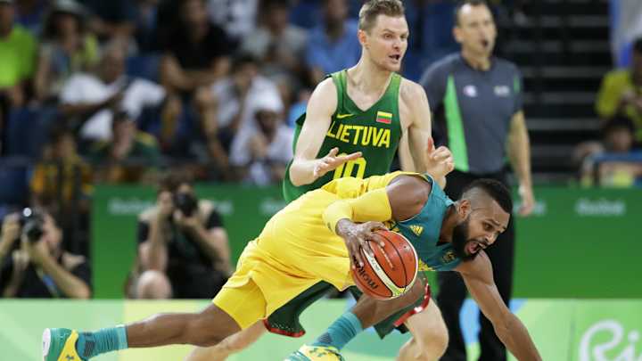 Australia rocks Lithuania 90-64, moves into men's semifinals Australia rocks Lithuania 90-64, moves into men's semifinals
