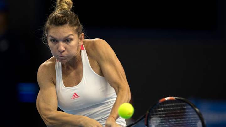 Halep cruises to win over Keys in opening WTA Finals match