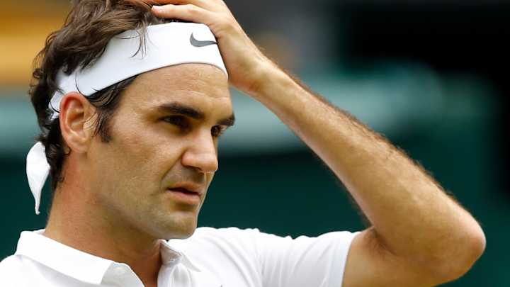 The Latest: Men's quarterfinals underway at Wimbledon