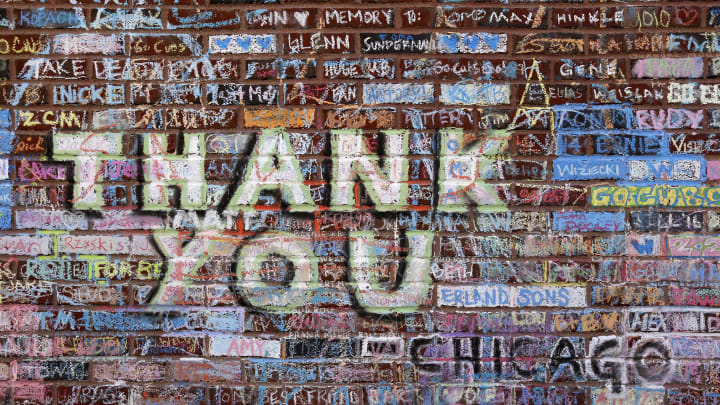 Cubs fans sign 'friendly chalkboard' on Wrigley walls