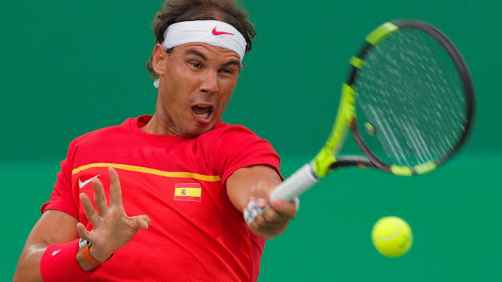 Left wrist 'not perfect,' Rafa Nadal wins return at Olympics Left wrist 'not perfect,' Rafa Nadal wins return at Olympics