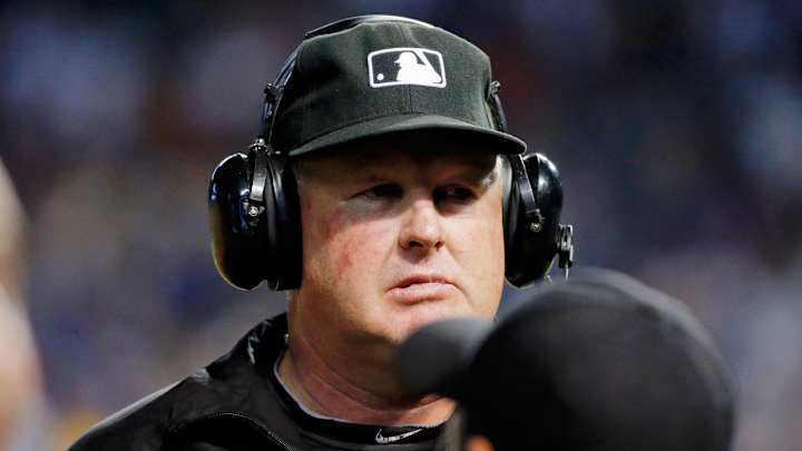 Why did umpire Bill Miller give this kid a baseball and then rip it from his glove?