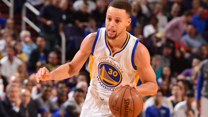 Curry flirts with triple-double, Warriors top Suns 112-104 Curry flirts with triple-double, Warriors top Suns 112-104