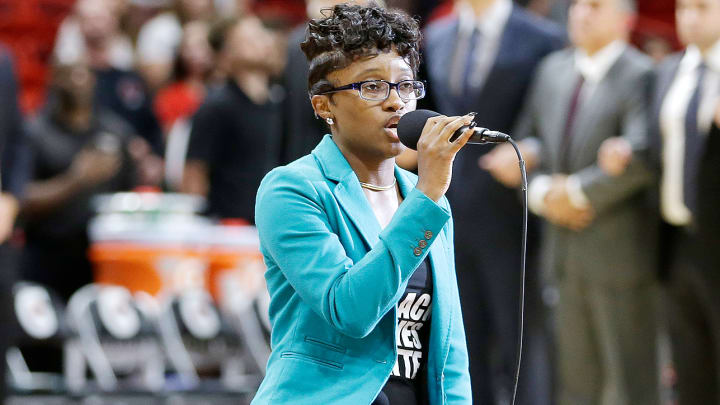 Watch: Heat national anthem singer takes knee, wears Black Lives Matter shirt Watch: Heat national anthem singer takes knee, wears Black Lives Matter shirt