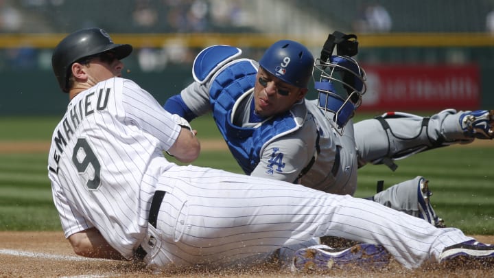 Toles hits grand slam, Dodgers rally for DH split with Rox