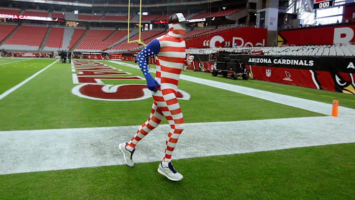 Carson Palmer was forced to warm up in this skin-tight American flag Carson Palmer was forced to warm up in this skin-tight American flag