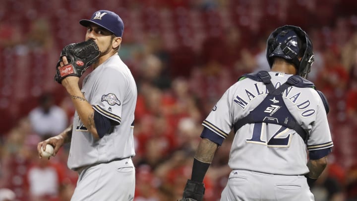 Brewers sloppy in 6-4 loss to Reds
