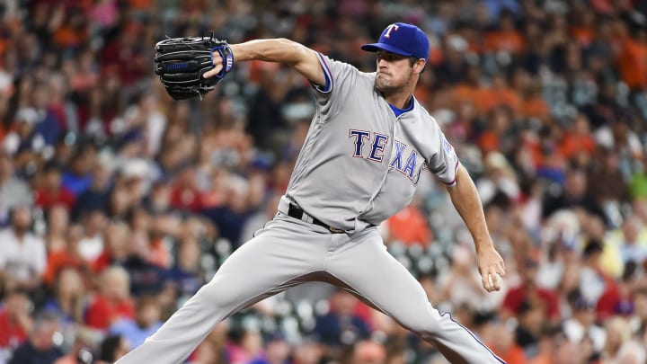 Hamels fans 11, Rangers down Keuchel, Astros 9-2 for sweep
