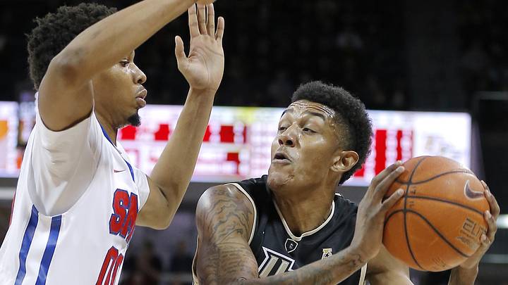 Short-handed No. 15 SMU still undefeated, beats UCF 88-73 Short-handed No. 15 SMU still undefeated, beats UCF 88-73