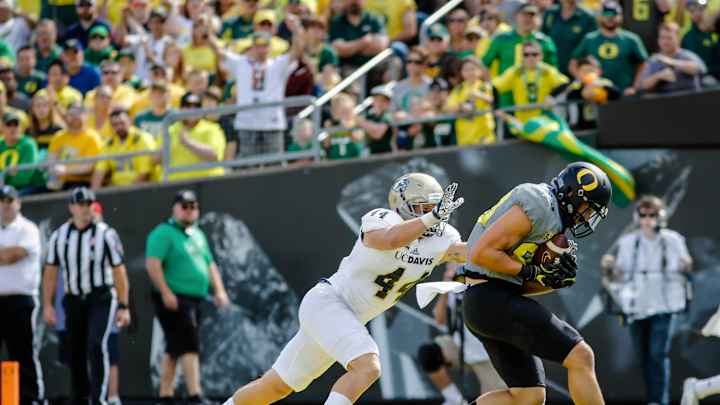 No. 24 Oregon downs UC Davis 53-28 in Prukop's debut