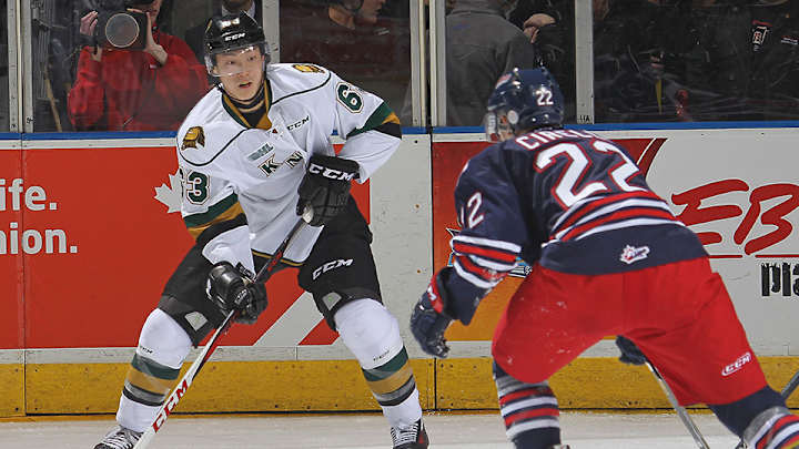 London Knights forward Cliff Pu celebrates goal with handshake