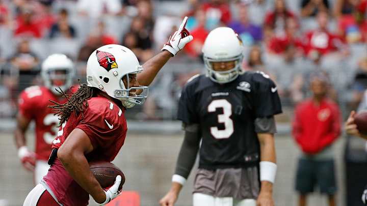 Cardinals extend contracts of Fitzgerald, Palmer