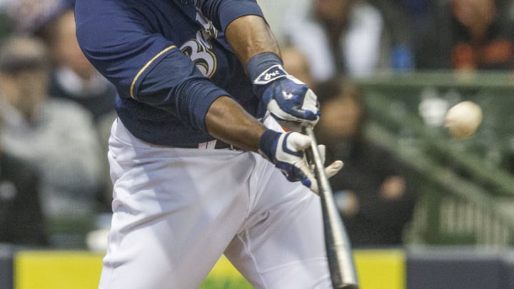 Carter homer, sacrifice fly lift Brewers over Giants