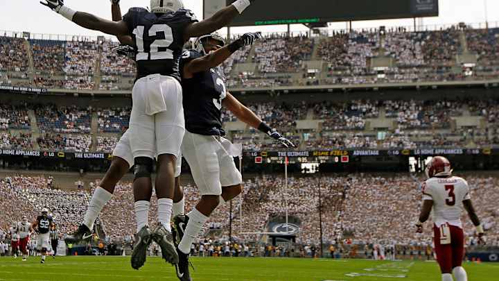 Despite criticism, Penn State honors Paterno during game Despite criticism, Penn State honors Paterno during game