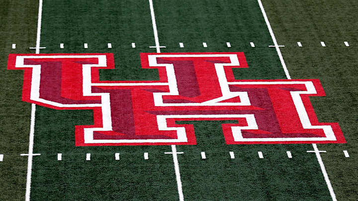 Houston on-field security worker charged with assault Houston on-field security worker charged with assault