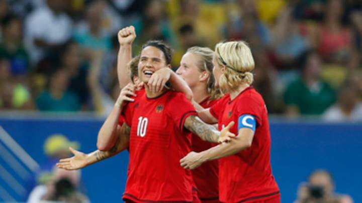 Neid goes out with gold as Germany defeats Sweden 2-1