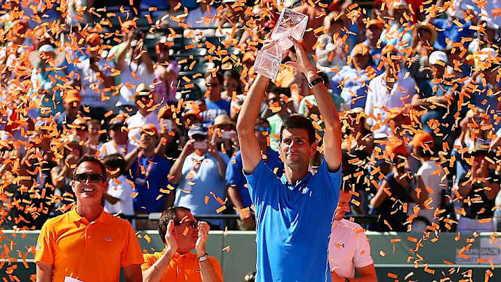 Novak Djokovic defeats John Isner