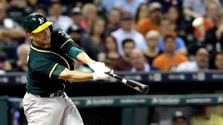Valencia's 2 homers lead A's over fading Astros 4-3