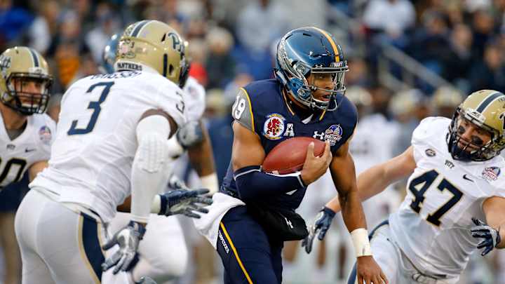Reynolds leads Navy over Pitt 44-28 in Military Bowl