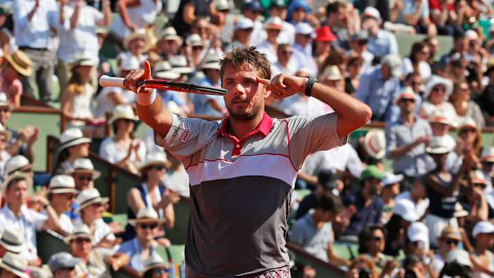 Wawrinka beats Tsonga to reach 1st French Open final