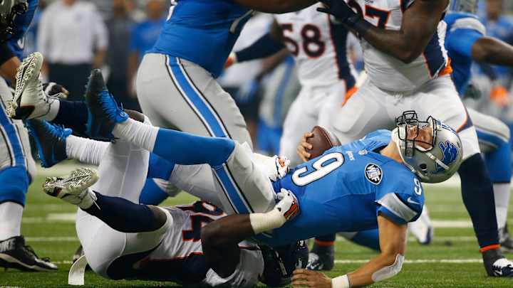 Peyton Manning throws 2 TD passes, Broncos beat Lions 24-12