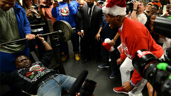 Watch: Kevin Hart takes on Cam Newton’s bench press challenge