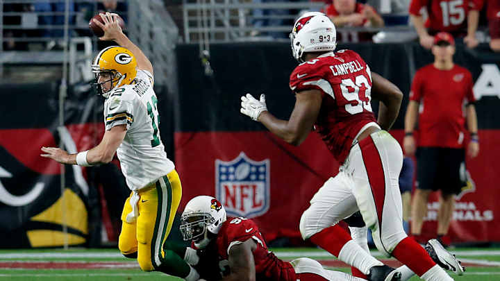 Cardinals sack Rodgers 8 times, rout Packers 38-8