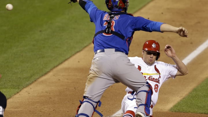 Bourjos scores on throwing error in 10th as Cards beat Cubs