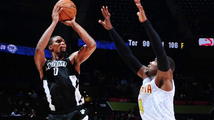 Bloodied but undaunted, Heat snap skid against Hawks 100-88