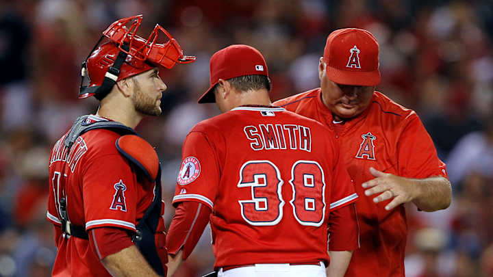 Rangers rally with 3 in 8th to beat Angels 7-6