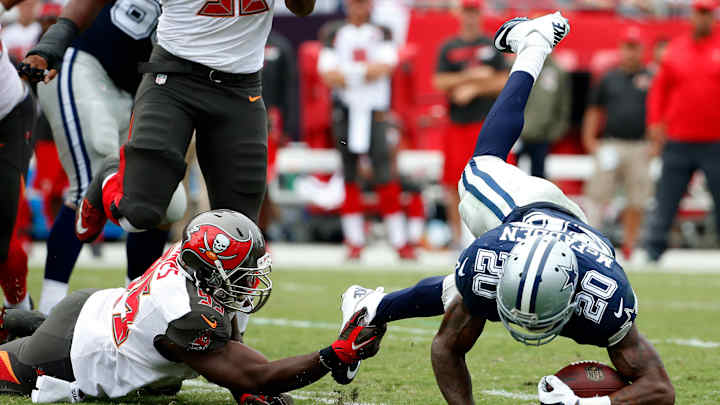 Cowboys welcome back Romo, still seeking better run game