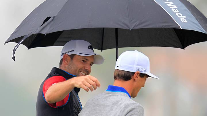 Garcia leads drizzly BMW Masters by 1 stroke