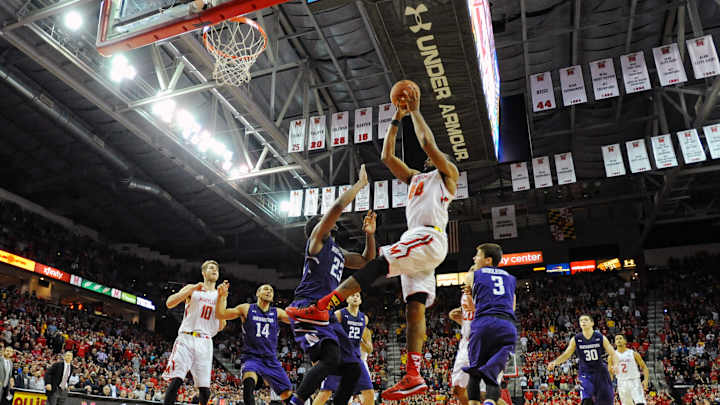 Dez Wells hits putback to help No. 13 Maryland top Northwestern