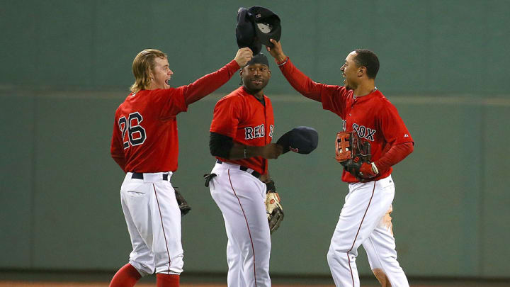 Watch: Red Sox OF Mookie Betts robs home run and goes over the wall