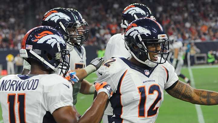 Manning debuts and reserves lead Broncos over Texans 14-10 Manning debuts and reserves lead Broncos over Texans 14-10
