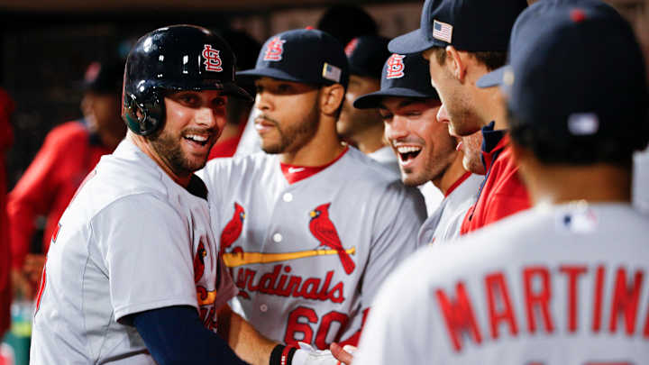 Cardinals lose 4-2 to Reds in resumption of suspended game