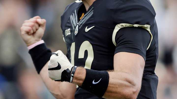 Motley overcomes mistakes to lead Hokies past Purdue 51-24