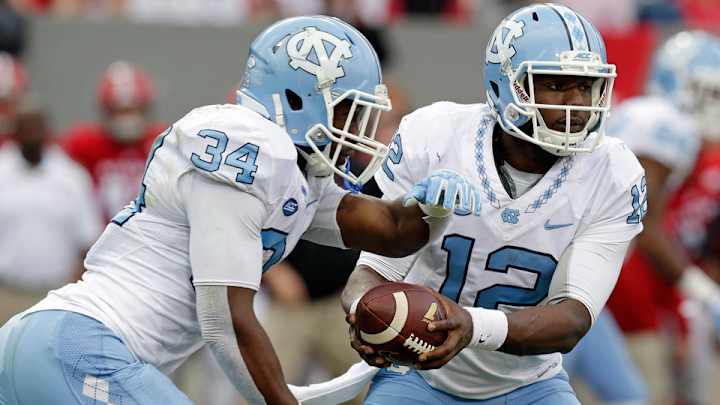 Week 14 college football picks: USC vs. Stanford, UNC vs. Clemson, more Week 14 college football picks: USC vs. Stanford, UNC vs. Clemson, more